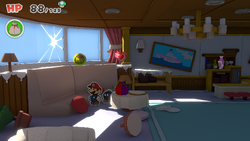 Mario standing near a 100-Coin, a Healing Heart and a Small Bag of Confetti on The Princess Peach ship of The Origami King.