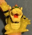 A finger puppet of Bowser from Mario Party 7 by Tomy