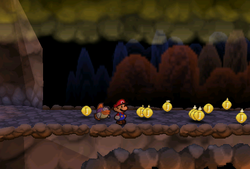 Mario finding 10 Coins after jumping over first firebar in Mt. Lavalava of Paper Mario.