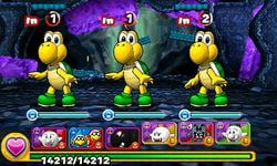 Screenshot of the boss battle in World 1-2, from Puzzle & Dragons: Super Mario Bros. Edition.