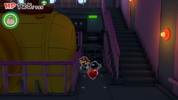 Mario standing near a Healing Heart on The Princess Peach ship of The Origami King.