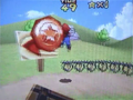 An early appearance of a Red Coin in Bob-omb Battlefield seen at the E3 2004 demo of Super Mario 64x4[3]