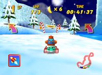 Banjo races in the Snowflake Mountain stage, Walrus Cove, in Diddy Kong Racing.