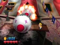 Clown missiles being shot at Wario in Wario World.