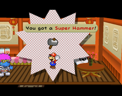 Mario getting the Super Hammer from Podler in Glitzville of Paper Mario: The Thousand-Year Door.