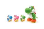 Promotional image of the Yarn Yoshi and Mega Yoshi amiibos