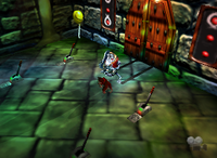 A yellow Banana Balloon and a setup for a Golden Banana for Donkey Kong in Creepy Castle.