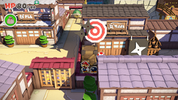 Mario standing near a 100-Coin in Shogun Studios of The Origami King.