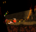 Donkey Kong crouches under the wall after the Continue Barrel