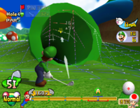 Luigi about to hit the ball into a pipe in Mario Golf: Toadstool Tour.
