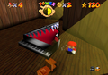 The Mad Piano attacking Mario in Super Mario 64