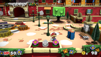 Mario in the right of lower red district, around objects containing Coins in Port Prisma of Paper Mario: Color Splash.