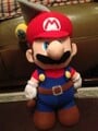 A plushie of Mario and F.L.U.D.D. from Super Mario Sunshine by Nippon Auto
