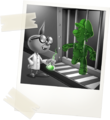 Gooigi successfully slipping through grates after E. Gadd applied the newly-found mixture