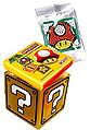 Mario-themed Snerdles are fruity squares that are made out of symbols such as a Mushroom, a coin, and a Starman. Produced by Au'some Candies, they are packaged in Question Block tins[4] or as a flow bag.[5]