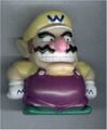 A finger puppet of Wario from Mario Party 7 by Tomy
