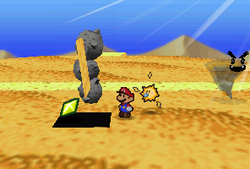 Mario finding a Star Piece under a hidden panel near the stone cactus in Dry Dry Desert in Paper Mario