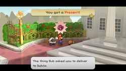 Mario getting the Present from Bub in Poshley Heights of Paper Mario: The Thousand-Year Door for Nintendo Switch.