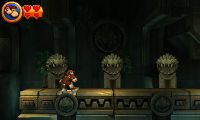 Donkey Kong and Diddy Kong enter a shrine with Ack statues.