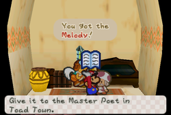 Mario receiveing Melody from Toad in a Desert in Dry Dry Outpost of Paper Mario.