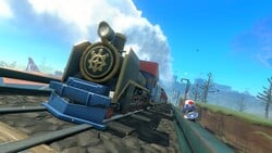 Toad (Pro Racer) grinding on a guard rail to chase the Whistlestop Summit train in Mario Kart World