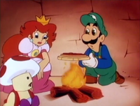 Mario friends' cooking his pizza in The Super Mario Bros. Super Show! episode "Quest for Pizza"