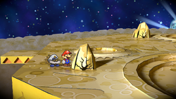 Mario near the rock containing a POW Block on the Moon of Paper Mario: The Thousand-Year Door for Nintendo Switch.