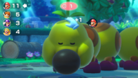 Mario pets Wiggler in Don't Wake Wiggler! from Super Mario Party