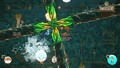 Yoshi damaging the moon's core after reaching it through the vines