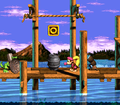 The Kongs stand near the Koin in the original version of the game.