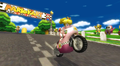 Peach using her Mach Bike on Mario Circuit