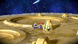 Mario near the rock containing a Volt Mushroom on the Moon of Paper Mario: The Thousand-Year Door for Nintendo Switch.