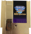 The golden NES cartridge replica included in the Deluxe Set