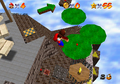 Screenshot of Hoot carrying Mario in Super Mario 64
