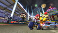 Mario and Bowser racing on Mario Kart Stadium.