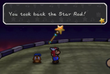 Mario takes back the Star Rod after defeating Bowser.