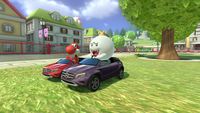 Red Yoshi and King Boo in Mario Kart 8 Deluxe