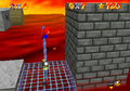Mario climbing a pole in Super Mario 64