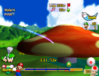 A mushroom about to bounce back a ball in Mario Golf: Toadstool Tour.