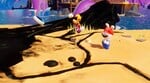 Rayman and Rabbid Mario about to enter the Punch Pals battle in Mario + Rabbids Sparks of Hope