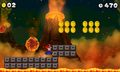 Mario near volcanic debris in a volcano level.