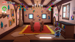 Mario standing near a cupboard containing a Healing Heart in Toad Town of The Origami King.