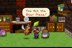 Mario getting a Star Piece from Mayor Penguin in Paper Mario