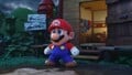 Mario in front of his house