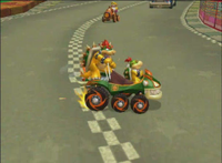 BowserandBowserJr.DriftingonMushroomBridgeinMKDDDemoMovie.png