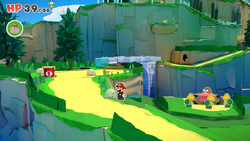 Mario standing near a rock containing a Small Bag of Confetti in Overlook Mountain of The Origami King.