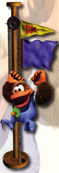 Kiddy Kong overlaps a Level Flag in Donkey Kong Country 3.