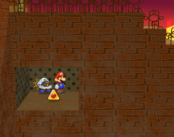 Mario near the HP Plus badge in Riverside Station of Paper Mario: The Thousand-Year Door.