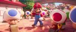 Mario tipping his cap after handing back a coin to one of the Toads