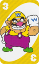 The Yellow Three card from the UNO Super Mario deck (featuring Wario)